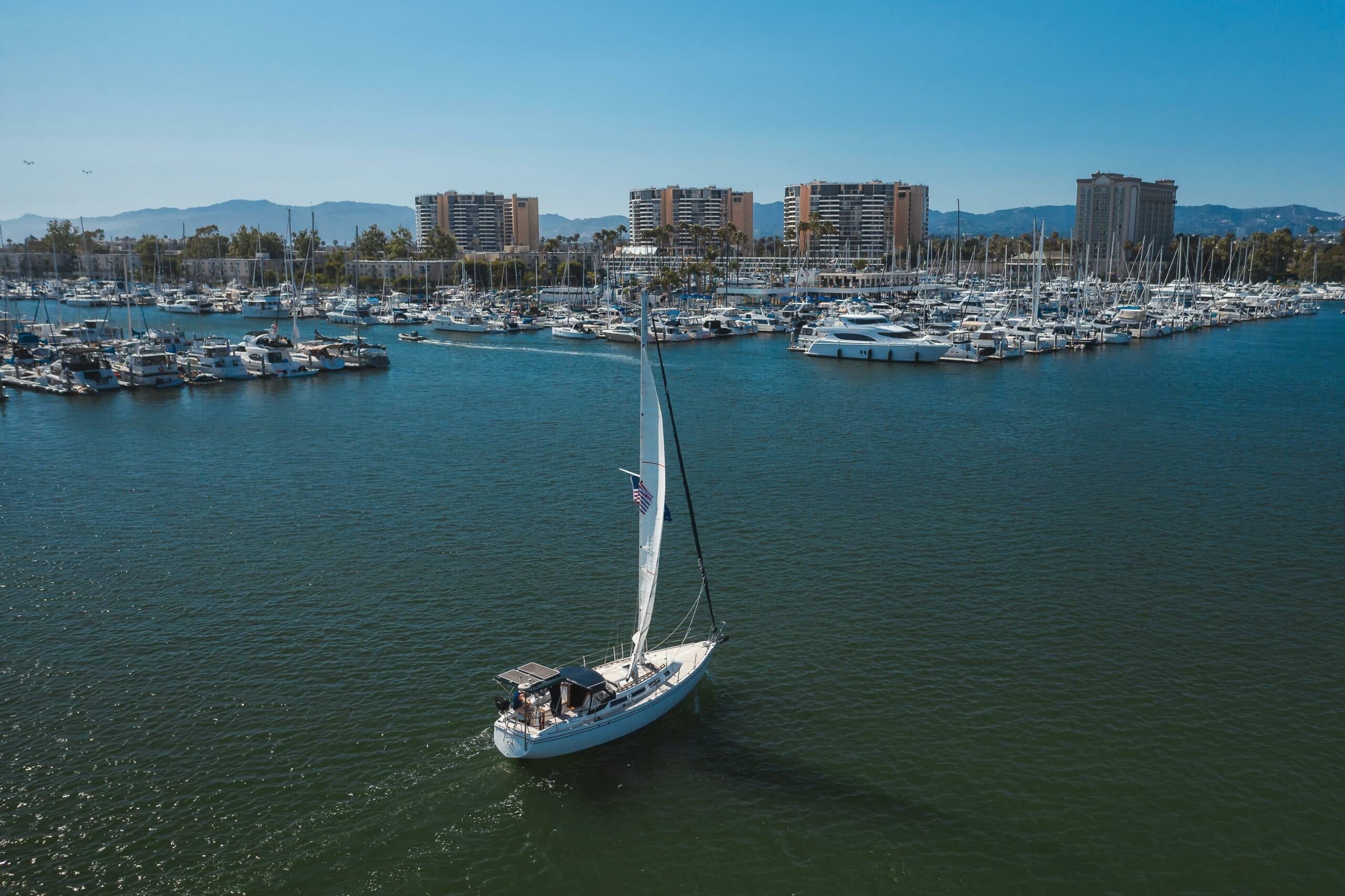 Boat cruising through harbor